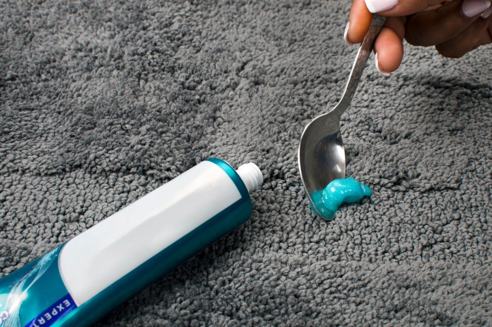 how to get toothpaste out of a carpet