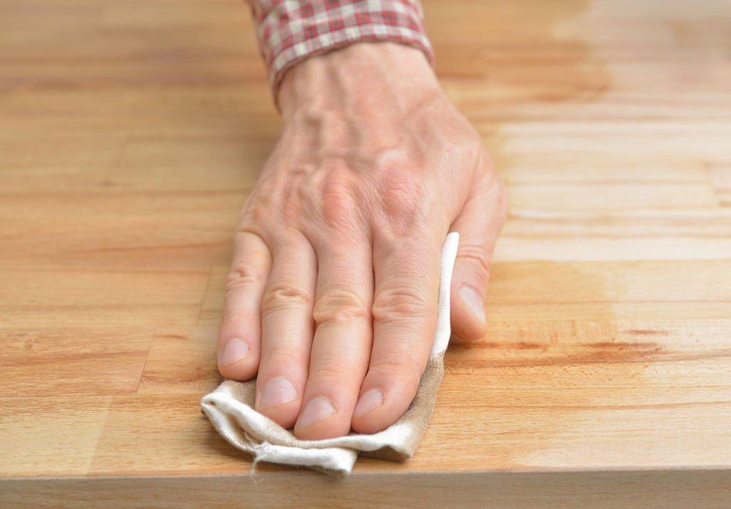 how to remove hand oil from wood furniture